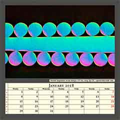 Polished longitudinal section through a 045 bass string, Epi-DIC, captured field width 1mm