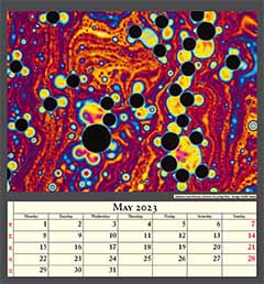 Intense interference colours of a soap film.  Image width 2mm